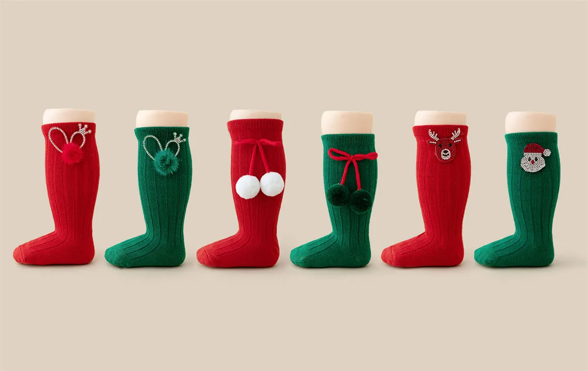 Wholesale rhinestone Christmas baby girls socks with Santa, reindeer and pom pom designs. Wholesale rhinestone Christmas baby girls socks with Santa, reindeer and pom pom designs.