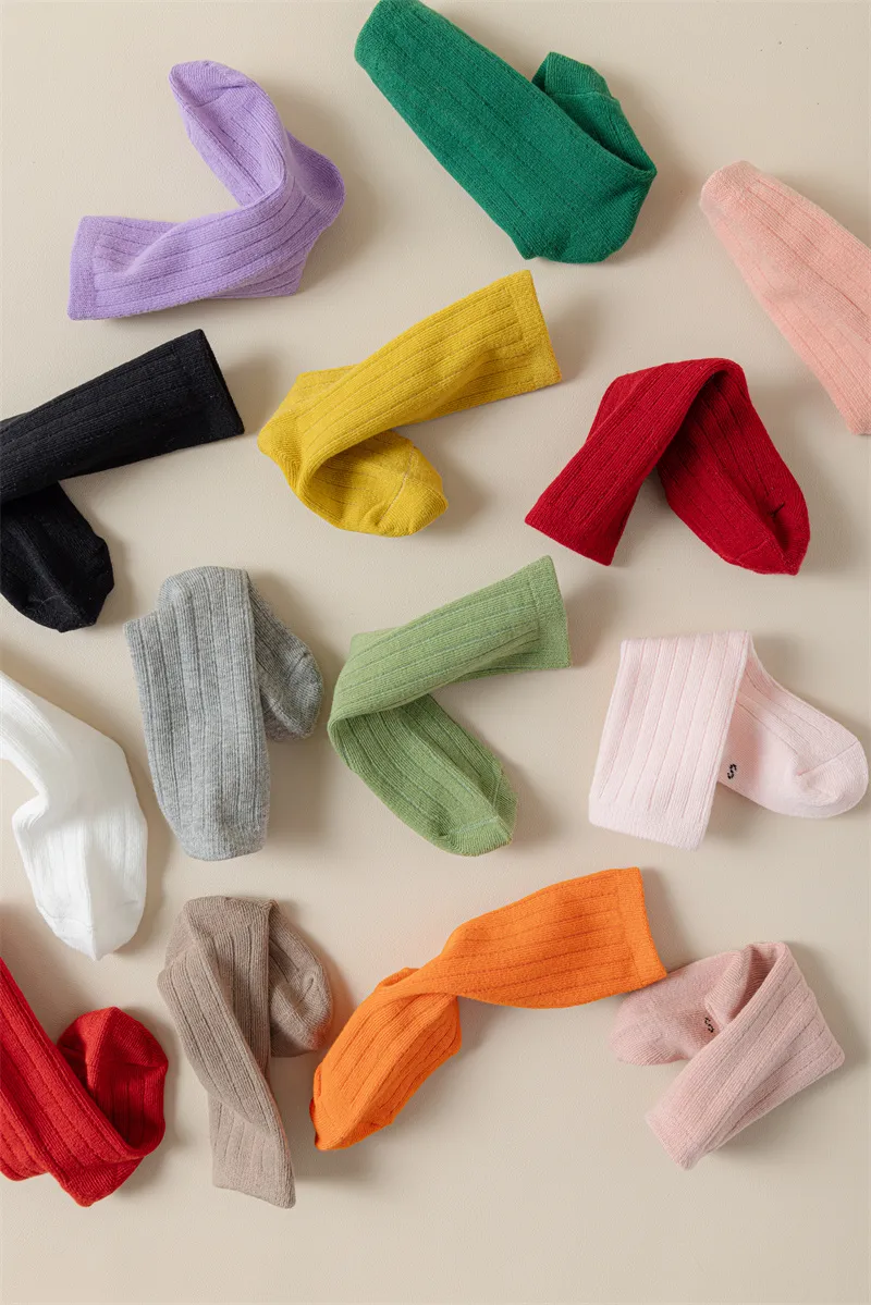 Colorful baby socks wholesale pack featuring 12 different colors.